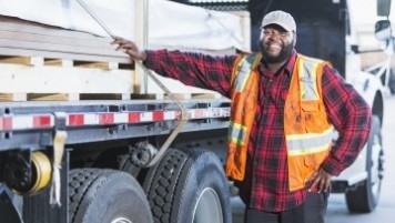 Man standing by truck