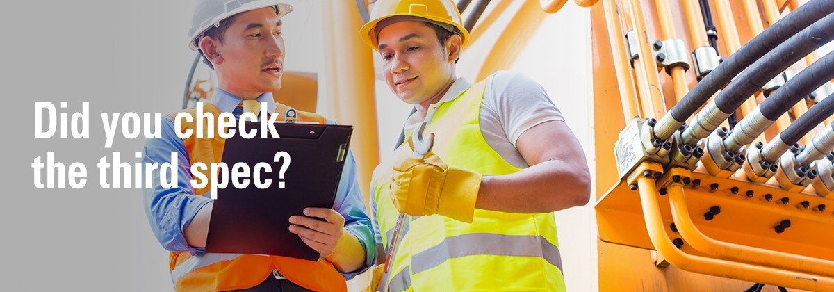 2 men checking third spec