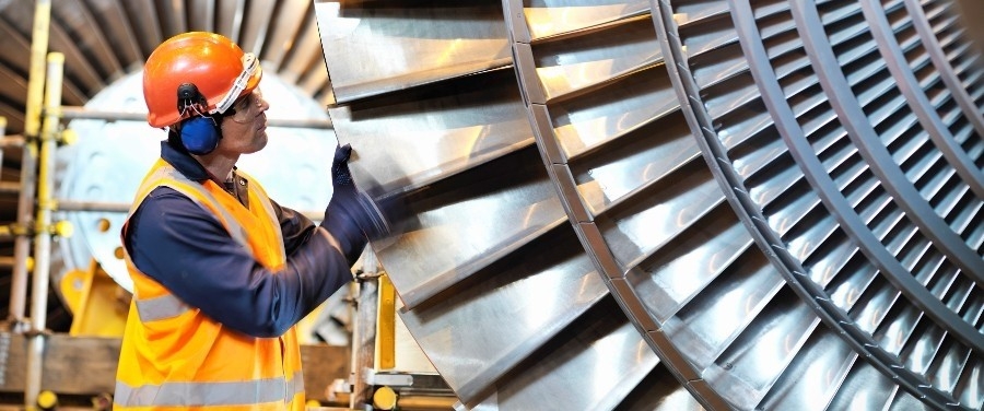 Man inspecting for varnish