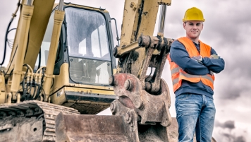 Man standing by equipment