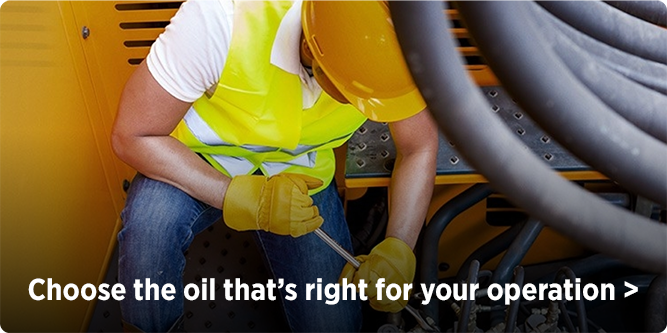 man checking oil