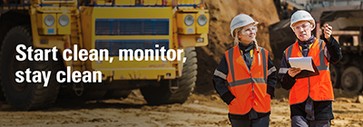 2 people inspecting site